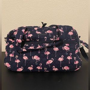 Vera Bradley small weekender bag. Pattern is flamingos with a navy background.